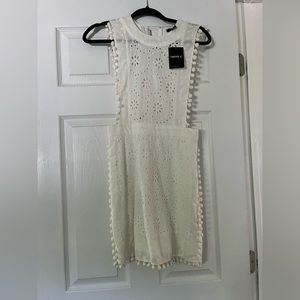 Pom pom eyelet dress